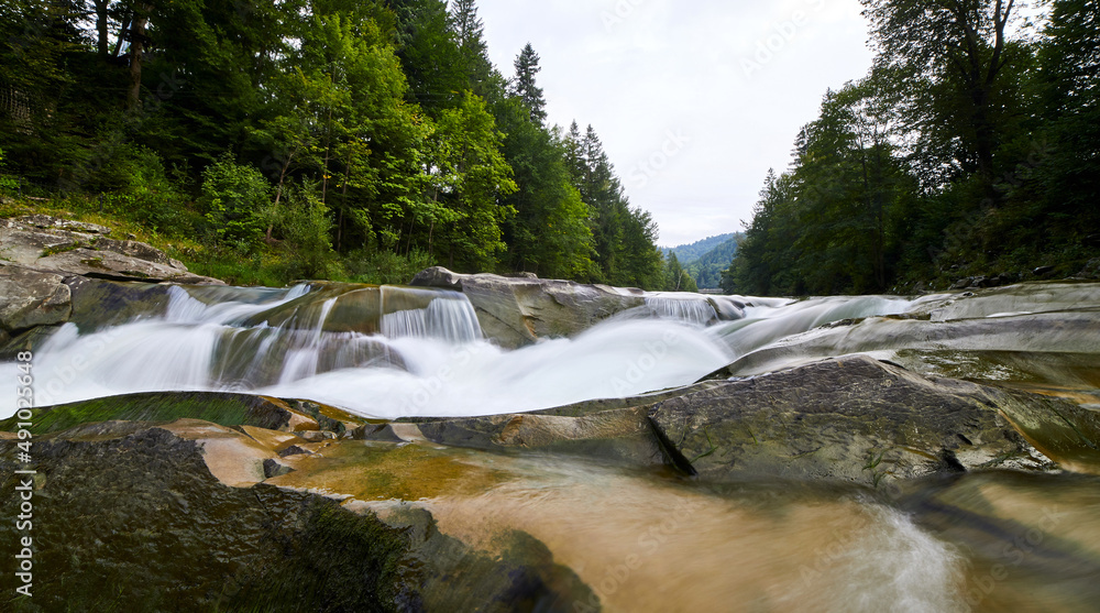 The mountain river Prut and waterfalls Probiy in Yaremche, Carpathians, Ukraine The mountain river Prut and waterfalls Probiy in Yaremche, Carpathians, Ukraine