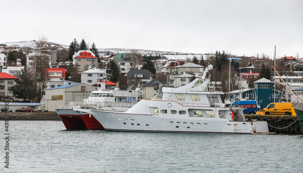 Ships are moored in port of Hafnarfjordur