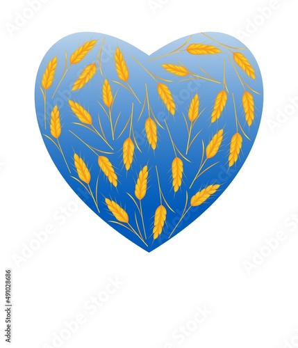 Golden ears of corn against the blue sky in the form of a heart.
