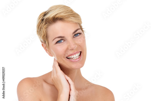 My skin is looking amazing. Cropped shot of a gorgeous young woman isolated on white.