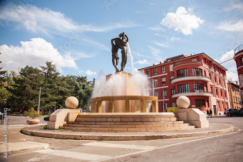 L'aquila, Italy, fountain with water jets. Fountain spraying water