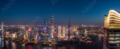 Aerial view of city skyline and modern commercial buildings in Shanghai at night  China.