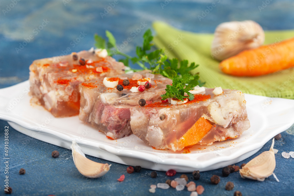 Pihtije - serbian traditional dish - aspic with pork meat and vegetables. Meat jelly - holodets, pihtija or galareta.
