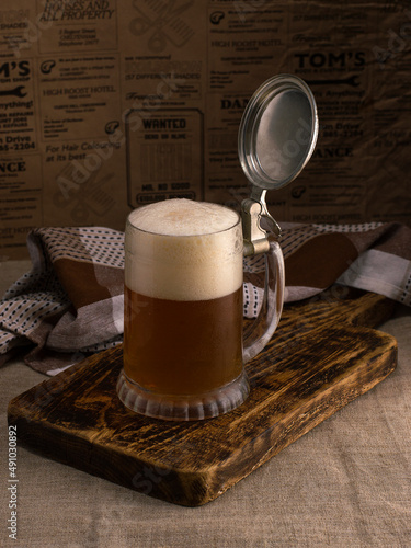 mug of light beer, foamy drink.