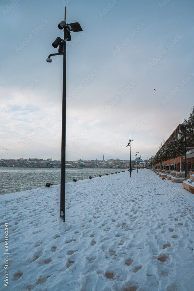 streets of Istanbul on winter. winter landscape in İstanbul. Winter landscape covered with snow. New Year`s landscape. Dramatic wintry scene. 
