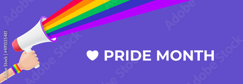 Pride month banner with 3d cartoon hand and loudspeaker. 3d cartoon hand holds loudspeaker with colorful rainbow. LGBT vector illustration. Symbol of pride month isolated on violet background.