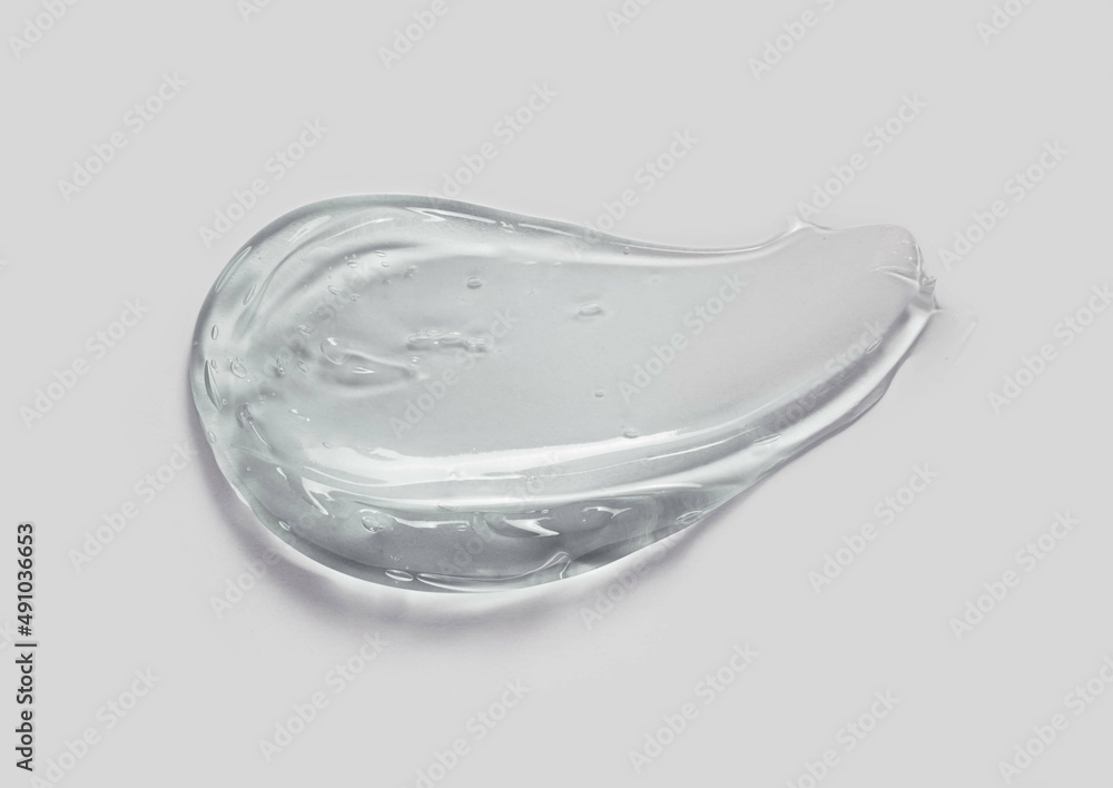 Liquid gel cosmetic smudge drops texture green grey background Liquid gel cosmetic smudge drops texture green grey background