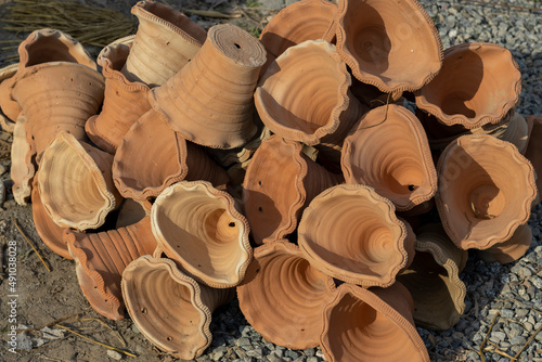 Clay pots for hanging plants or handmade wall planters