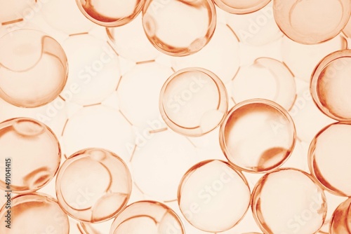 Cosmetic orange cllagen texture molecular ingredient moisturizer face skin care photo