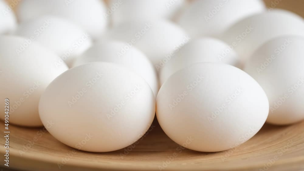 Chicken egg, rotation shot, Chicken fresh raw eggs.Healthy fresh food ingredients for breakfast. Animal products. Grocery. Chicken farm fresh eggs Chicken egg, rotation shot, Chicken fresh raw eggs.Healthy fresh food ingredients for breakfast. Animal products. Grocery. Chicken farm fresh eggs