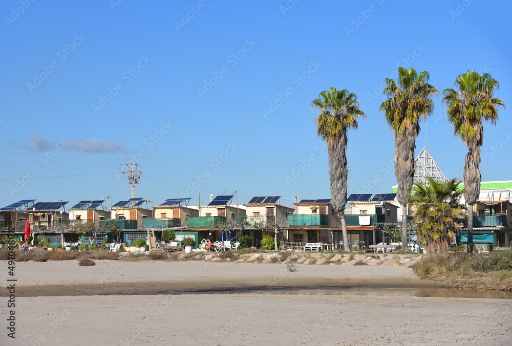 Little house near beach, Alboraya. Small houses of fishermen is a group of 31 houses. Wooden fisherman's house. Сottages for fisherman. Camping near sea. Camp Homes and Weekend houses.
