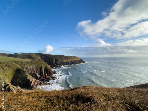 The coastal path along the cliffs at Manorbier, Pembrokeshire, Wales photo