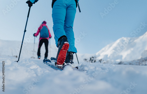 Lowsection of ski touring couple hiking up in the Low Tatras in Slovakia.