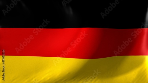 National flag of Germany. German flag waving against background.