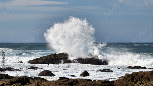 waves crashing on rocks