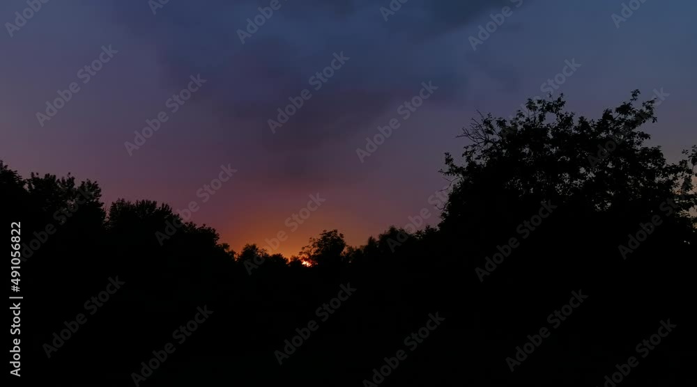 Lightning Strikes And Flashes Over The Forest During Sunset Lightning Strikes And Flashes Over The Forest During Sunset