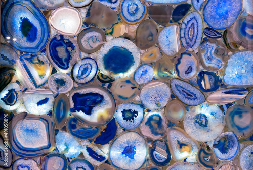 Photos Blue agate in section. Texture and background of blue agate.