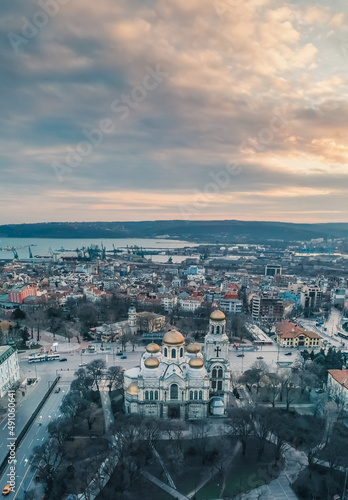 Panoramic Dawn view of Varna city. Famous monument of comunist party and beatiful skyline . Colorful morning scene of Bulgaria, Europe. Traveling concept background.