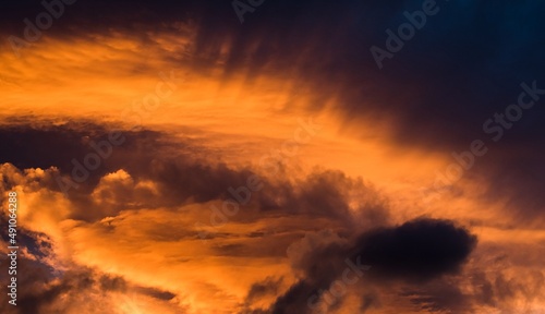 Bloody clouds, sunset, contrast and beautiful scenery, beautiful weather and life. Warm and dynamic scenery.