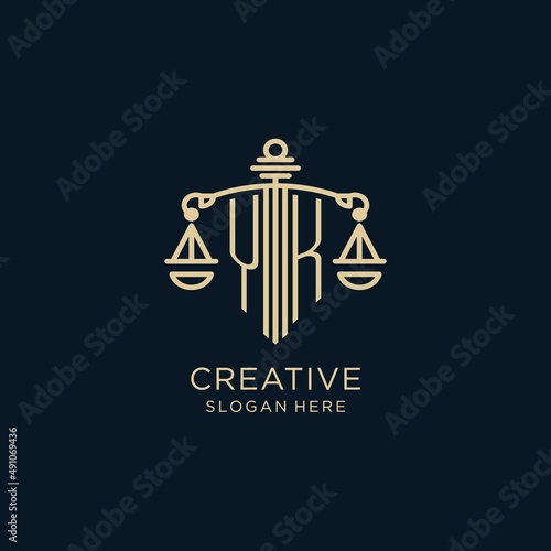 Initial YK logo with shield and scales of justice, luxury and modern law firm logo design