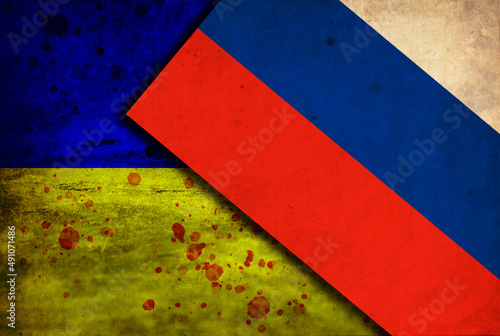 Ukrainian and Russian flags with rustic effect © Vicente Sargues