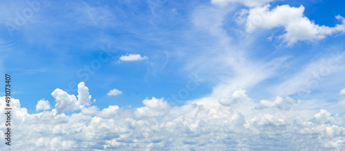 Panorama fluffy clouds in blue sky © Singha songsak