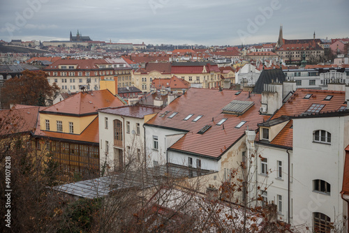 view of the wet roofs of Prague and Prague Castle