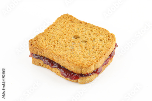 Toast sandwich with red fruit marmalade isolated on white background. Jam jelly spread snack
