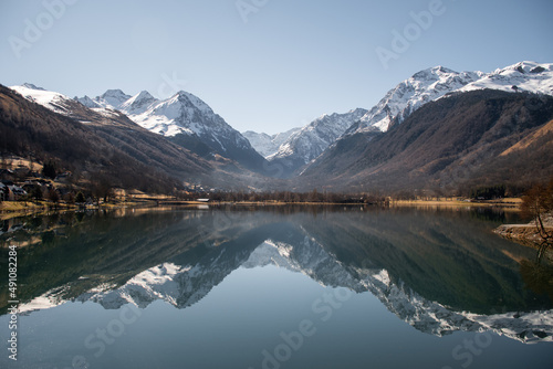 Beautiful reflection of the mountains in the Genos Loudenvielle lake, France