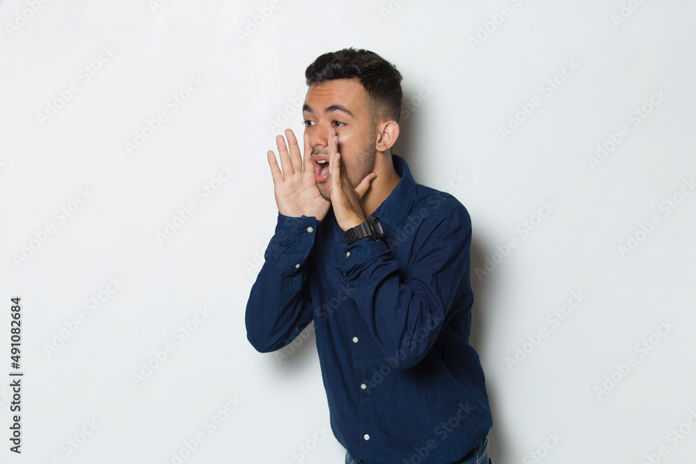 young handsome business man shouting and yelling announcing isolated on white background
young handsome business man shouting and yelling announcing isolated on white background
