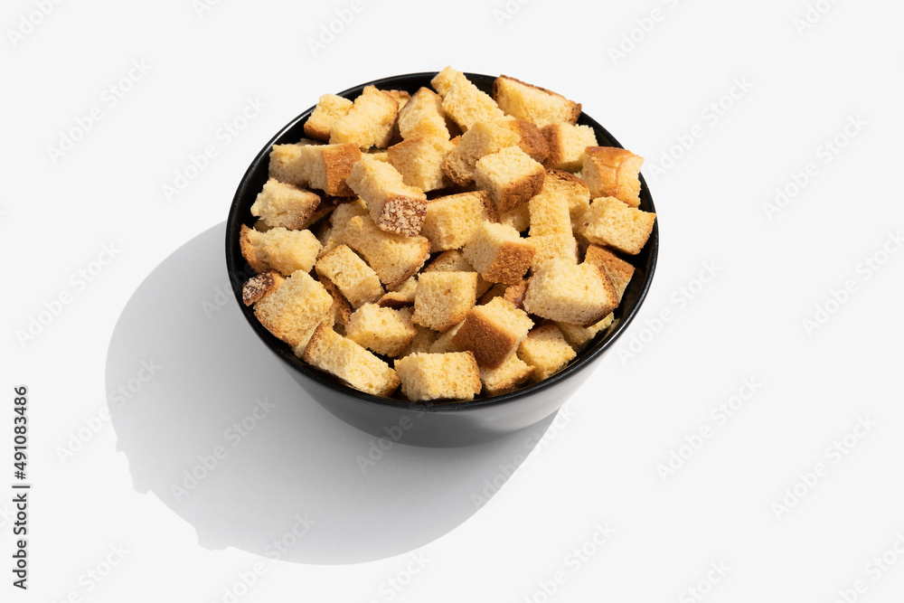 Black cup plate vanilla sweet square crackers on a white background close-up top view mockup Black cup plate vanilla sweet square crackers on a white background close-up top view mockup