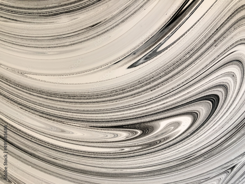 Black and white abstraction with liquid acrylic paint. Smooth lines and stains. . High quality photo Black and white abstraction with liquid acrylic paint. Smooth lines and stains. . High quality photo