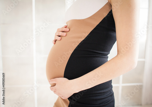 belly of a pregnant woman
