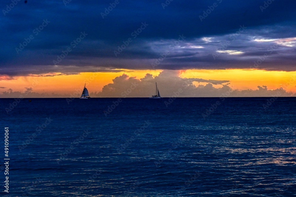 Yachts Passing each other at Dusk