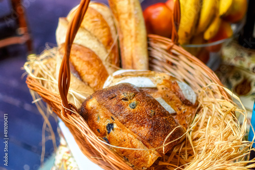 Freshly baked bread in wicker basket.