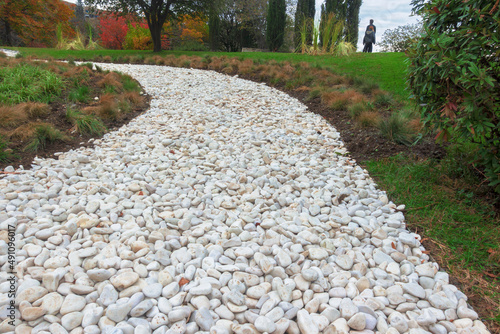 Walkway in the park of white gravel.