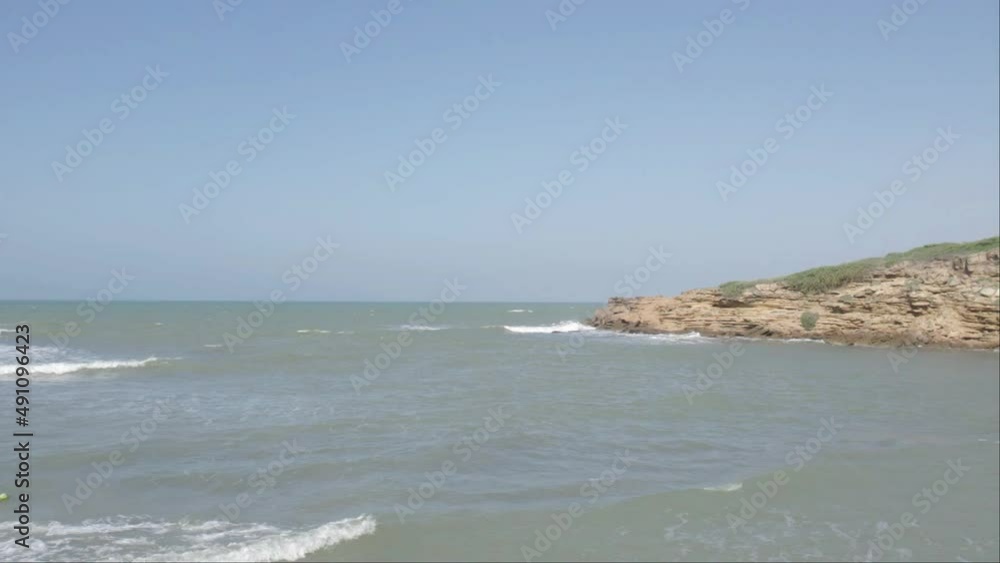 Aerial view of the beach against the blue sky. Video taken in La Guajira, Colombia Aerial view of the beach against the blue sky. Video taken in La Guajira, Colombia