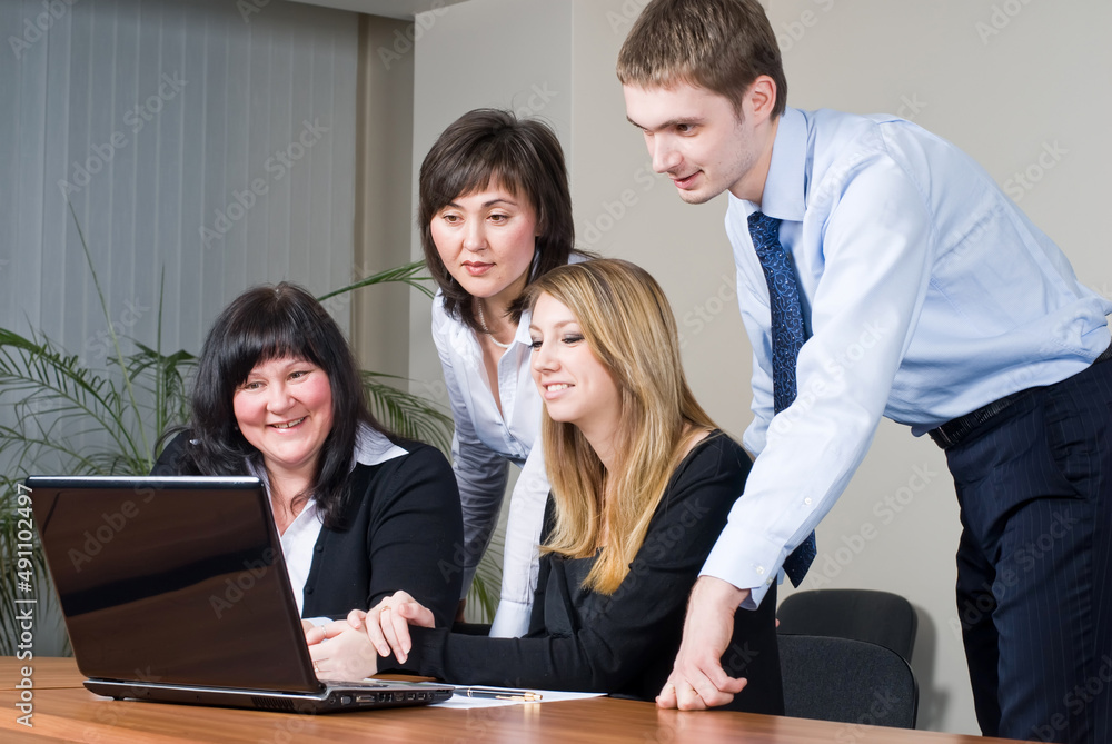 Business team discussing documents and ideas Business team discussing documents and ideas
