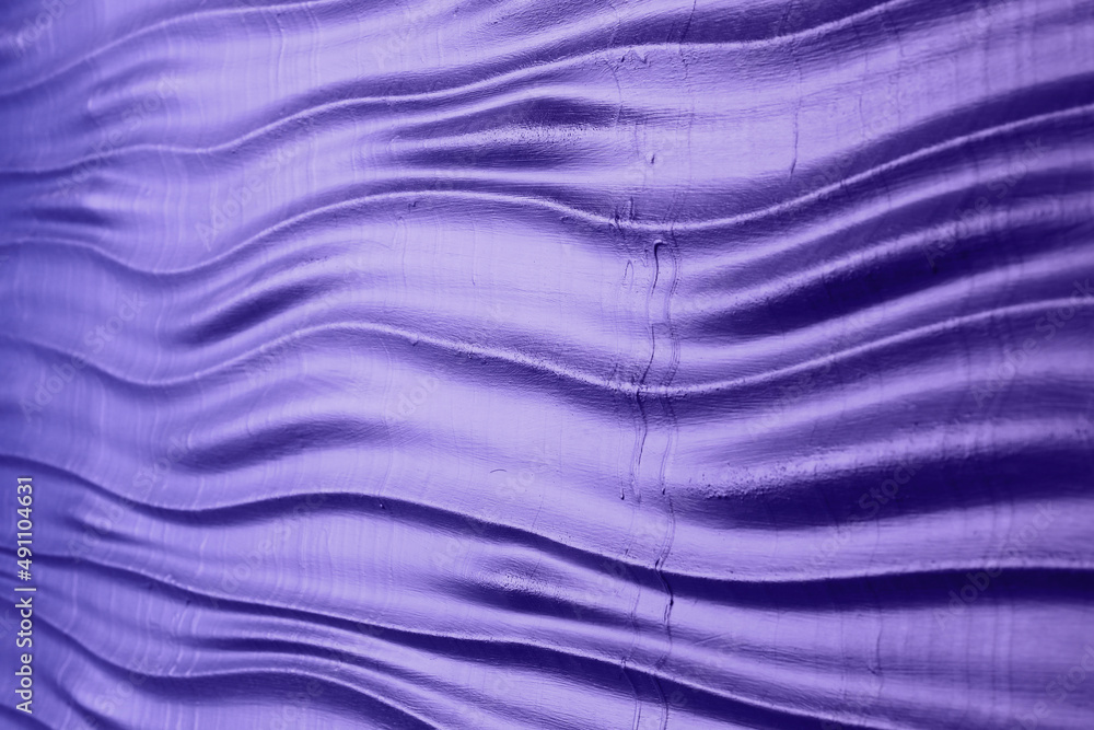Abstract background: purple wavy texture. Decorative wall decoration