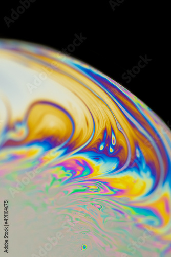 Experiment done with soap and sugar. A psychedelic result captured with a macro lens