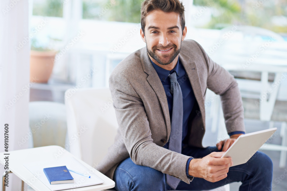 Stop dreaming start doing. Shot of a businessman using his digital tablet. Stop dreaming start doing. Shot of a businessman using his digital tablet.