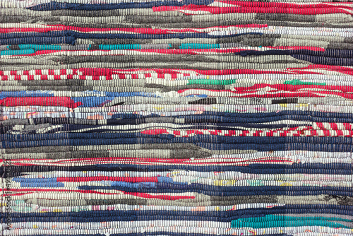 Multi Colored textile homespun rug. Closeup