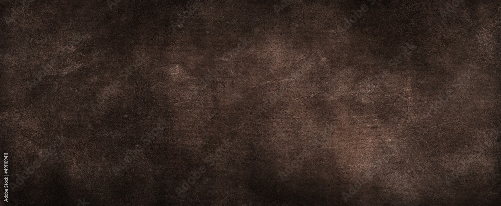 textured dark background with scratches, scuffs and stains. blank backdrop of black color for copy space