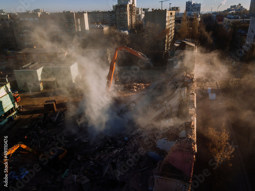 Aerial view of demolition site. Process of demolition of old industrial building