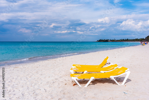 Beacn chairs on Vadadero Beach in Cuba photo