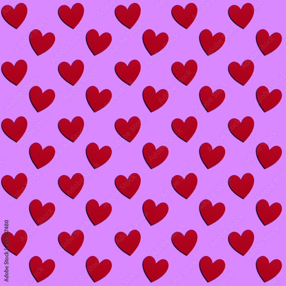 Hearts pattern background on pink 