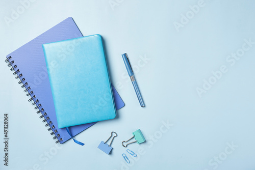 Bright office workspace. Work space with notepad, keyboard, coffee and glasses. Work space table desk. Flat lay, top view, copy space