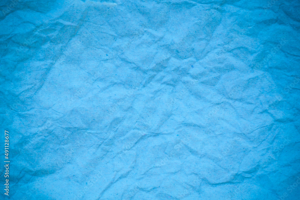 Blue crumpled paper background. Blue crumpled paper background.