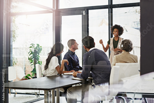 Whats the word Im looking for. Shot of businesspeople in an office.