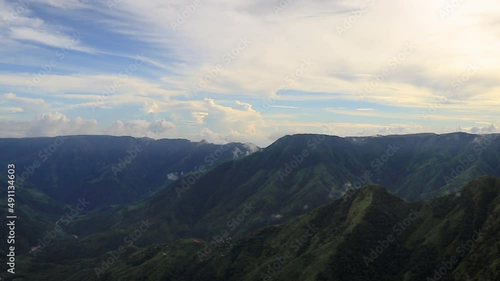 mountain valley with dramatic sky and cloud movement at morning time lapse mountain valley with dramatic sky and cloud movement at morning time lapse
